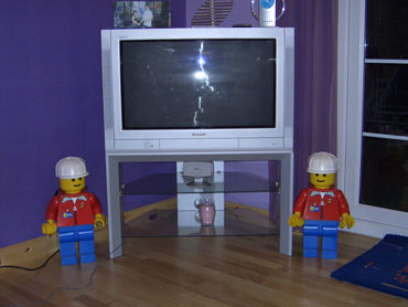 Giant minifigs guarding the TV